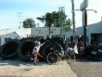 john checking out a tire for his bicycle - think this'll fit?