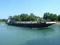 barge about to pass under bridge