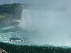 looking down bottom of Horseshoe Falls at Maid of the Mist tourist boat