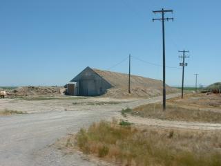 Storage shed with dirt roof