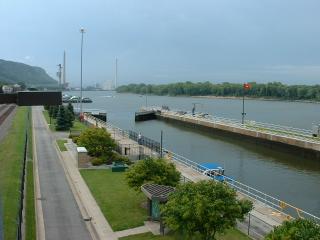Coal barges loading into lock