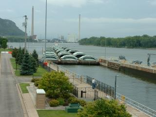 Coal barges loading into lock