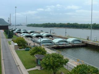 Coal barges loading into lock